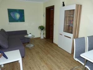 A seating area at Ferienhaus Blümel inkl. freier Strandbadeintritt
