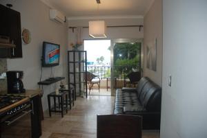 TV a/nebo společenská místnost v ubytování E&J Beach Condo