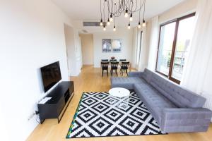 TV a/nebo společenská místnost v ubytování Komfortowy apartament Międzyzdroje