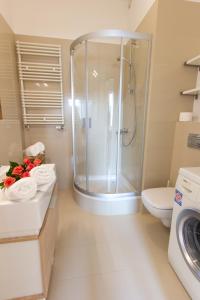 Koupelna v ubytování Komfortowy apartament Międzyzdroje + 24 fotografií