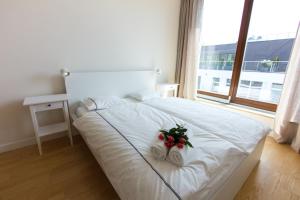 Postel nebo postele na pokoji v ubytování Komfortowy apartament Międzyzdroje