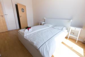 Postel nebo postele na pokoji v ubytování Komfortowy apartament Międzyzdroje