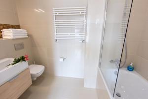 Koupelna v ubytování Komfortowy apartament Międzyzdroje