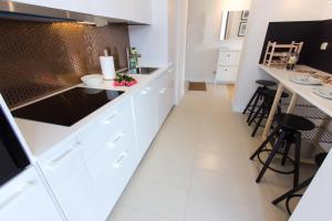 Kuchyň nebo kuchyňský kout v ubytování Komfortowy apartament Międzyzdroje