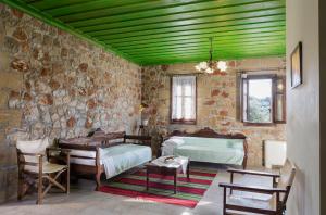 A seating area at Klymeni Traditional Homes