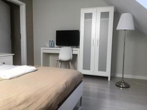 Posteľ alebo postele v izbe v ubytovaní Grota Bochotnicka