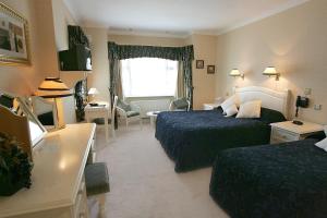 Voodi või voodid majutusasutuse Killeen House Hotel toas