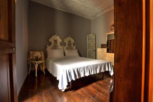 En eller flere senge i et værelse på La mia casa di campagna