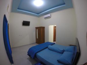 Postel nebo postele na pokoji v ubytování Ady Homestay
