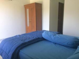 Postel nebo postele na pokoji v ubytování Ady Homestay