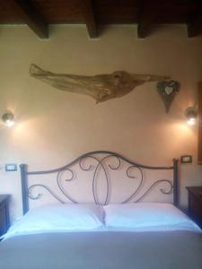 Postel nebo postele na pokoji v ubytování B&B Da Giua'