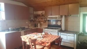 Kuchyň nebo kuchyňský kout v ubytování B&B IN FATTORIA