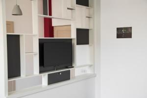 
Телевизор и/или развлекательный центр в Park Apartments by Picnic
