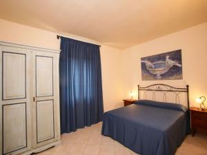 Postel nebo postele na pokoji v ubytování Residence Terme Di Sorano