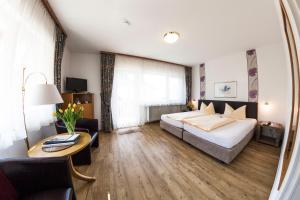 Postel nebo postele na pokoji v ubytování Hotel Neuenfels