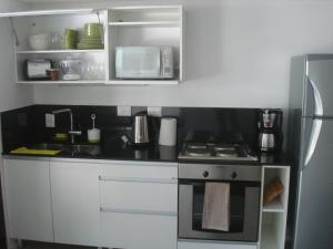 Kuchyňa alebo kuchynka v ubytovaní Premium Libertador