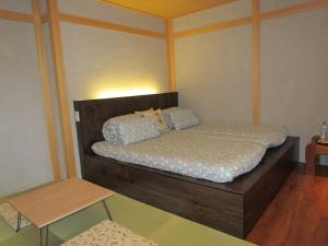 九份小町民宿客房内的一张或多张床位