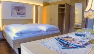 Postelja oz. postelje v sobi nastanitve Hotel Both