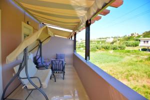 A balcony or terrace at Luxury Suites in Stavromenos