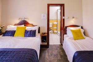 Letto o letti in una camera di The Harp