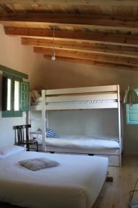 Tempat tidur susun dalam kamar di El Zarzal