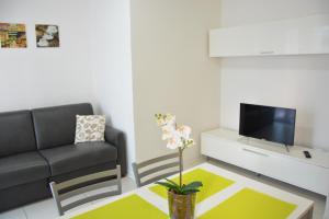 A television and/or entertainment centre at Green Residence