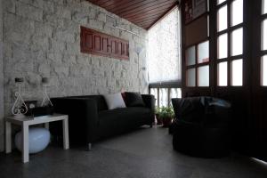 Uma rea de estar em Alecrim Rosmaninho Guest House