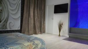 Μια τηλεόραση ή/και κέντρο ψυχαγωγίας στο Hello Villa +26 φωτογραφίες