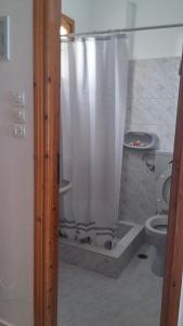 A bathroom at Vrohaki Studios & Rooms Még 37 kép