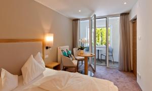 Postel nebo postele na pokoji v ubytování Hotel Schennerhof