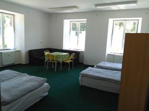 Postel nebo postele na pokoji v ubytování Pension na hranici