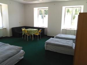 Postel nebo postele na pokoji v ubytování Pension na hranici