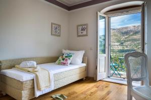 Кровать или кровати в номере Iconic Villas - Villa Rosa +31 фотография