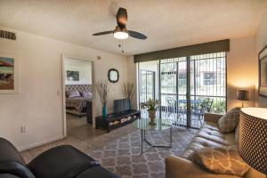 a living room with a couch and a table at 4601 W 46th Street court in Bradenton