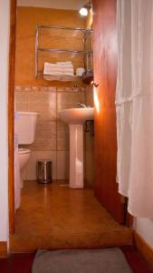 Een badkamer bij Divina Presencia