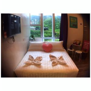 Postel nebo postele na pokoji v ubytování Hotel Flora Plus
