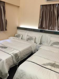 Katil atau katil-katil dalam bilik di Seasons Hotel - Causeway Bay