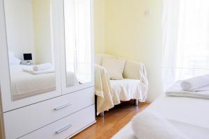 Posteľ alebo postele v izbe v ubytovaní Apartment ANA Podstrana