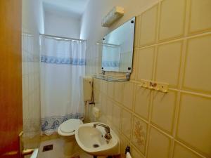 Kúpeľňa v ubytovaní Apartman Balen J. + 17 fotografií