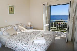 En eller flere senge i et værelse på Apartments Villa Lucy