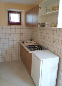 Kuchnia lub aneks kuchenny w obiekcie Apartmani Damiani