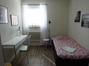 Postel nebo postele na pokoji v ubytování Ekbackens Vandrarhem