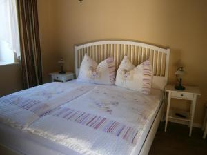 Кровать или кровати в номере Atriumhof