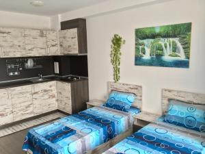 Кровать или кровати в номере Sarafovo Sea & Forest