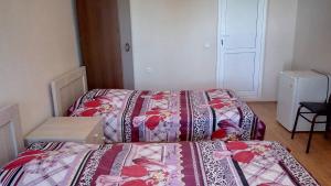 Letto o letti in una camera di Mari Guest House