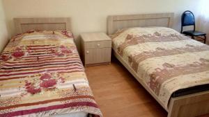 Letto o letti in una camera di Mari Guest House