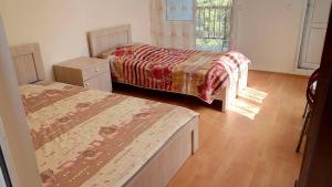 Letto o letti in una camera di Mari Guest House