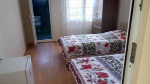Letto o letti in una camera di Mari Guest House