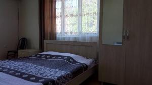 Letto o letti in una camera di Mari Guest House