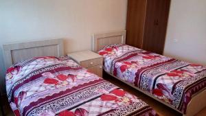 Letto o letti in una camera di Mari Guest House